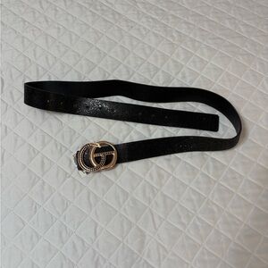 Black knock-off Gucci women’s belt